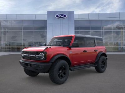 2026 Ford Bronco in Ruby Red Tinted — front three-quarter view