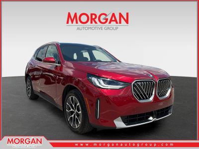 2025 BMW X3 30 xDrive in Red Metallic — front three-quarter view