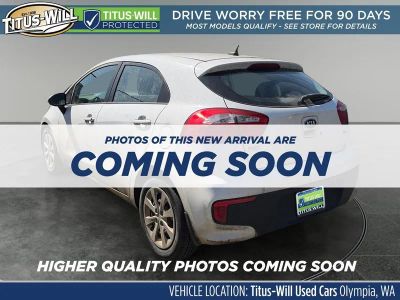 2016 Kia Rio — rear three-quarter view