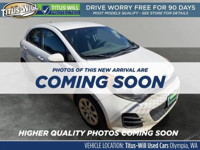 2016 Kia Rio LX in Clear White — front three-quarter view