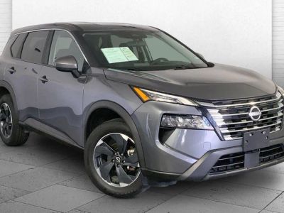 2025 Nissan Rogue SV in Gun Metallic — front three-quarter view