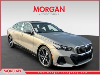 2026 BMW 5 Series 530i in Gray — front three-quarter view
