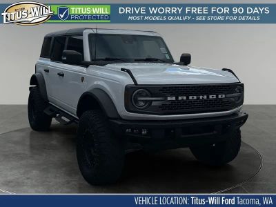 2023 Ford Bronco Badlands in Oxford White — front three-quarter view