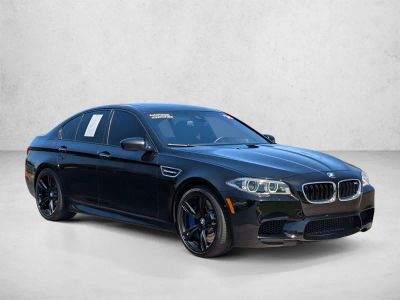 2016 BMW M5 — rear three-quarter view