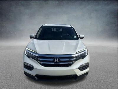 2017 Honda Pilot EX-L in White Diamond Pearl — front three-quarter view