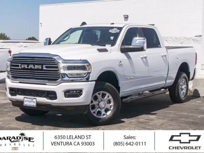 2024 RAM 2500 Laramie in Bright White Clea — front three-quarter view