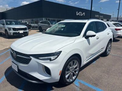 2022 Buick Envision Avenir in Summit White — front three-quarter view