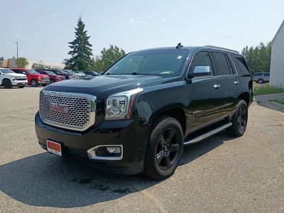 2018 GMC Yukon SLE in Onyx Black — front three-quarter view