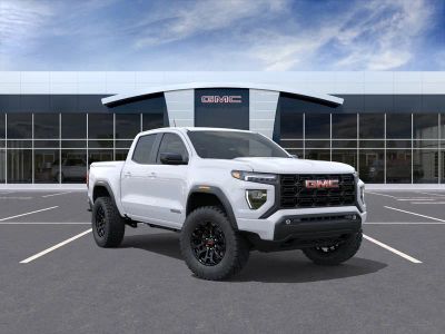 2026 GMC Canyon Elevation in Summit White — front three-quarter view