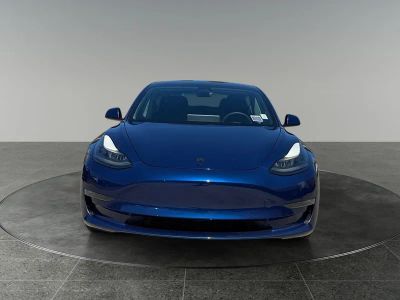 2021 Tesla Model 3 — side profile view