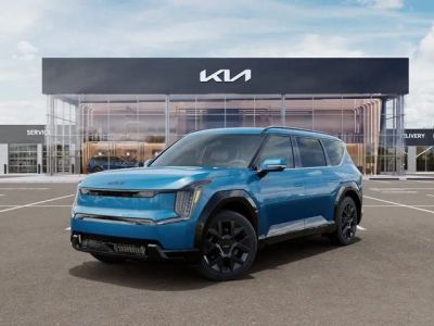 2026 Kia EV9 Land in Ocean Blue — front three-quarter view