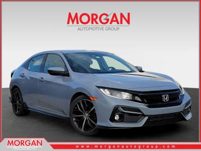 2021 Honda Civic Hatchback Sport in Sonic Gray Pearl — front three-quarter view