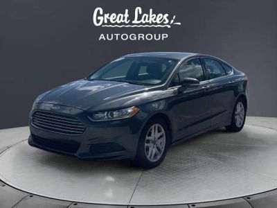 2016 Ford Fusion SE in Magnetic — front three-quarter view