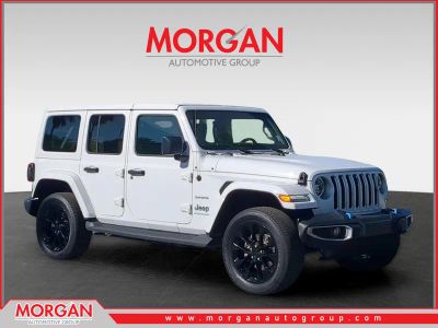 2023 Jeep Wrangler Sahara 4xe in White — front three-quarter view