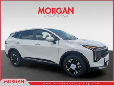 2026 Kia Sportage Hybrid LX in Snow White Pearl — front three-quarter view