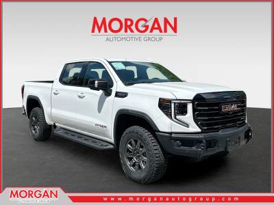 2024 GMC Sierra 1500 AT4X in White — front three-quarter view