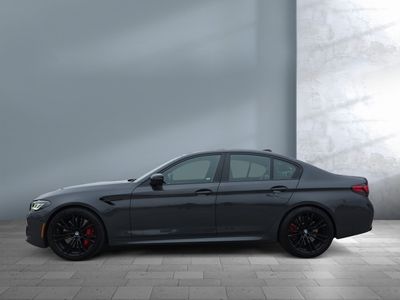 2021 BMW M5 — rear three-quarter view