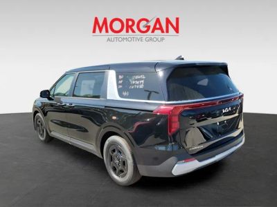 2026 Kia Carnival — rear three-quarter view