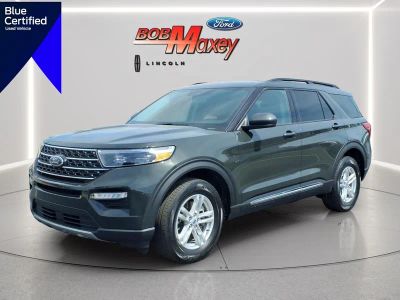 2023 Ford Explorer XLT in Forged Green Metallic — front three-quarter view
