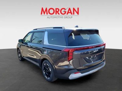 2026 Kia Carnival — rear three-quarter view