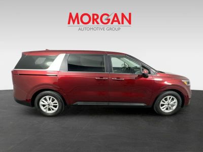 2023 Kia Carnival — side profile view