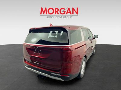 2023 Kia Carnival — rear three-quarter view