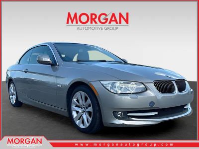 2011 BMW 3 Series 328i in Bronze Metallic — front three-quarter view