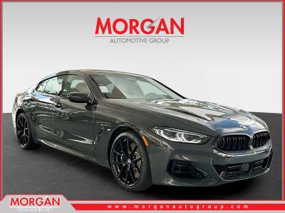 2026 BMW 8 Series 840i in Dravit Grey Metallic — front three-quarter view