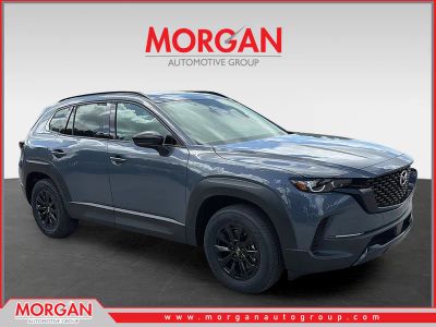 2026 Mazda CX-50 Hybrid Premium in Polymetal Gray Metallic — front three-quarter view