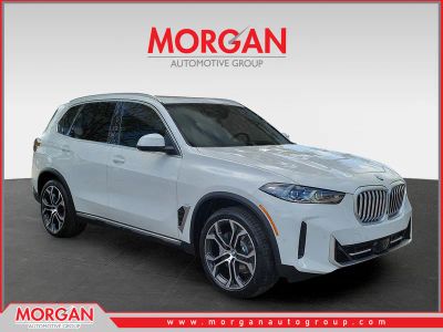 2026 BMW X5 sDrive40i in Alpine White — front three-quarter view