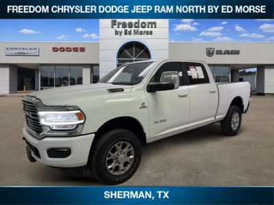 2024 RAM 2500 Laramie in Bright White Clearcoat — front three-quarter view