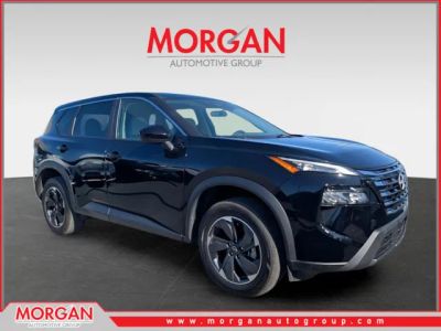 2025 Nissan Rogue SV in Black — front three-quarter view