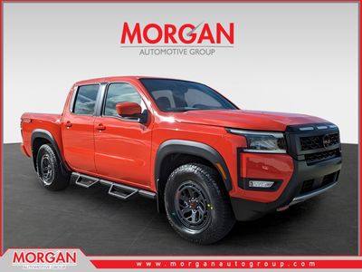 2026 Nissan Frontier PRO-X in Orange — front three-quarter view