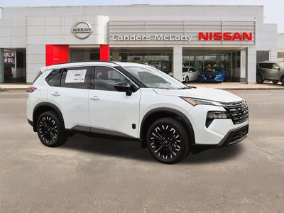 2026 Nissan Rogue Dark Armor — front three-quarter view
