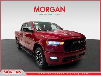 2026 Ram 1500 Laramie in Molten Red Pearlcoat — front three-quarter view