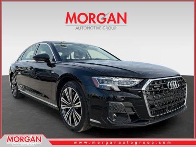 2023 Audi A8 L 55 in Black Metallic — front three-quarter view