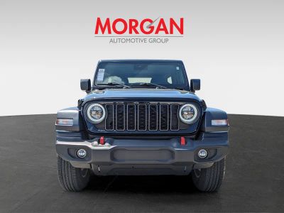 2024 Jeep Wrangler — rear three-quarter view