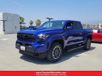 2024 TOYOTA TACOMA TRD SPORT DOUBLE CAB 5' BED AT in Blue Crush Metallic — front three-quarter view