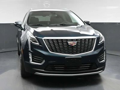 2025 Cadillac XT5 Premium Luxury in Emerald Lake Metallic — front three-quarter view