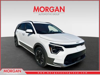 2025 Kia Niro EV Wave in Snow White Pearl — front three-quarter view