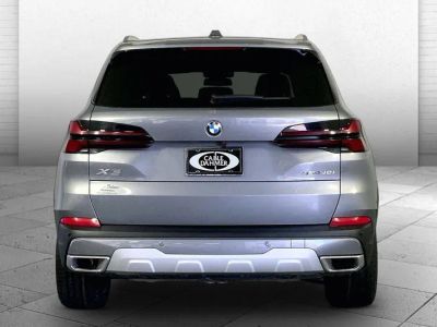 2025 BMW X5 — rear three-quarter view