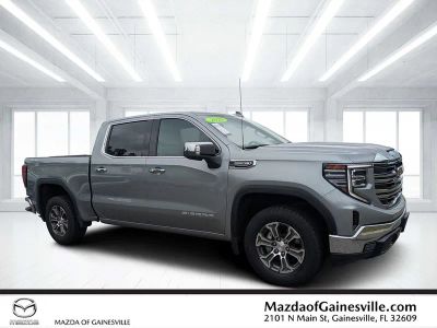 2025 GMC Sierra 1500 SLT in Silver — front three-quarter view