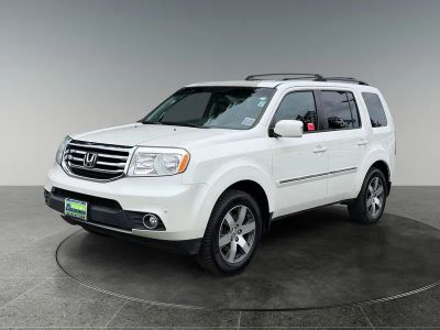 2013 Honda Pilot — rear three-quarter view