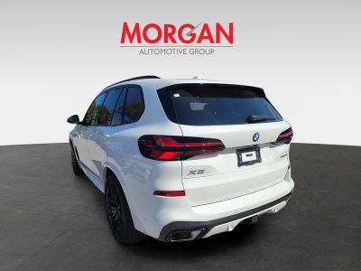 2026 BMW X5 — rear three-quarter view