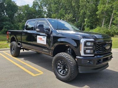 2026 Ford Super Duty F-350® Lariat® in Agate Black Metallic — front three-quarter view