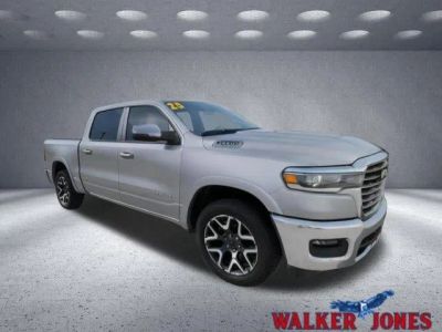2025 RAM 1500 Laramie in Silver — front three-quarter view