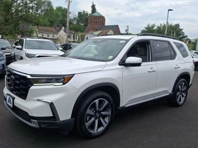 2023 Honda Pilot — rear three-quarter view