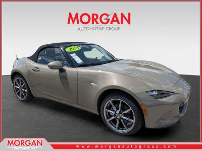 2023 Mazda MX-5 Miata Grand Touring in Zircon Sand — front three-quarter view