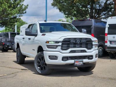 2026 RAM 2500 RAM 2500 BIG HORN CREW CAB 4X4 6'4' BOX in Bright White Clear-Coat Exterior Paint — front three-quarter view