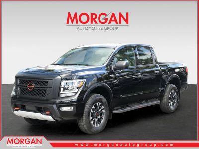 2024 Nissan Titan PRO-4X in Super Black — front three-quarter view